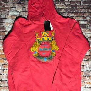 Nike Men's Red Hoodie with Graphic Design